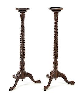 A Pair of English Mahogany Pedestals Height 51 1/2 inches.