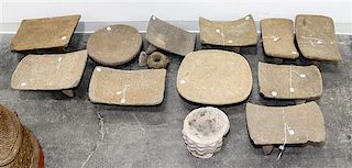 * A Group of Eleven Pre-Columbian Stone Grain Grinding Stools Height of largest 7 1/4 x width 17 x depth 12 1/2 inches.