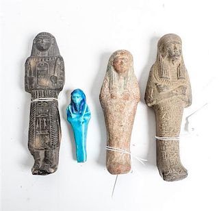 * A Group of Four Egyptian Ushabti Height of tallest 6 1/2 inches.