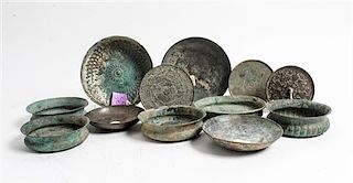 * A Collection of Archaic Bronze Bowls and Table Articles Diameter of largest 6 3/4 inches.