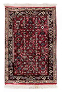 * An Indo-Persian Wool Rug 2 feet 11 inches x 2 feet.