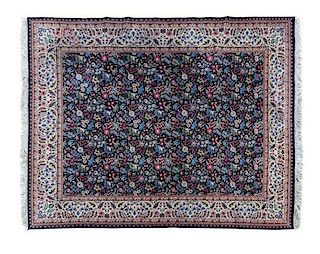 * A Pakistani-Kirman Wool Rug 10 feet 1 inch x 8 feet.