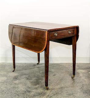 An English Pembroke Table Height 27 1/2 inches.