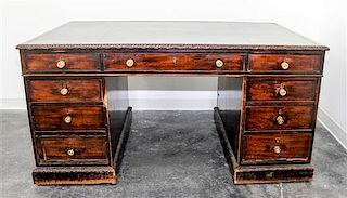 An English Mahogany Partners' Desk Height 29 3/4 x width 59 1/2 x depth 57 1/2 inches.