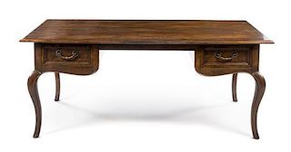 A Baker Writing Desk Height 29 1/4 x length 69 x depth 17 7/8 inches.