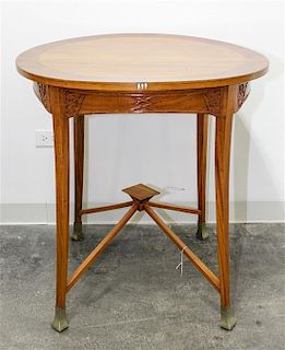 A Vienna Secessionist Occasional Table Height 31 3/4 x diameter 29 1/2 inches.