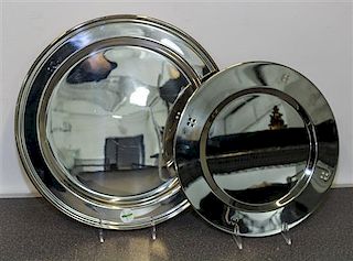 * A Reed & Barton Silver-Plate Round Platter, , together with a set of 4 unmarked stainless steel chargers.