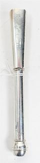 A Cartier Silver Muddler, New York, NY, the tapering square handle with canted corners surmounting a cylindrical stem with a 