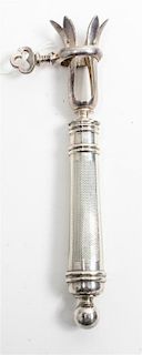 A French Silver Bone Holder, , the silver handle having engine turned decoration surrounding an engraved cartouche and having