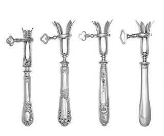 A Group of Three French Silver-Handled Bone Holders, various makers, the handles decorated with ribbon and bellflower motifs,