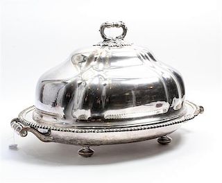 A Silver-Plate Cloche. Width over handles 26 1/2 inches.