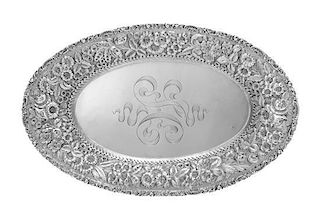 * An American Silver Bread Dish, Baltimore Sterling Silver Co., Baltimore, MD, having a foliate and volute decorated rim, the