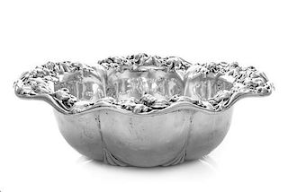 * An American Silver Bowl, Unger Bros., Newark, NJ, the undulating border with repousse floral decoration above the lobed bod