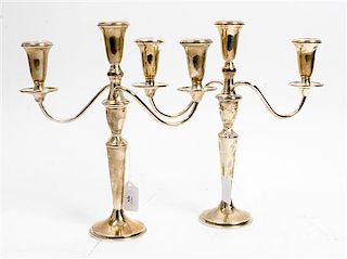 * A Pair of American Silver Three-Light Candelabra, Retailed by Neiman Marcus, 20th Century, the baluster form stem issuing t