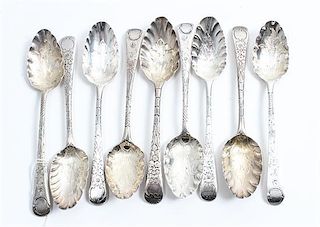 * A Group of Nine George III Silver Teaspoons, various makers, the scalloped bowls with stippled foliate decoration, the hand