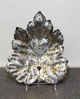 A Continental Silver Dish, maker's marks obscured, in the form of a leaf.