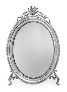 * A Polish Neoclassical Silver-Plate Table Mirror Height 25 1/4 inches.