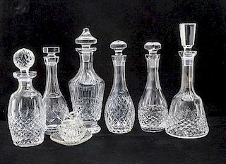 * Six Waterford Cut Glass Decanters Height of tallest 13 inches.