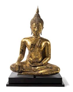 A Thai Gilt Bronze Figure of Seated Buddha