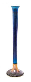 A Tiffany Studios Blue Favrile Glass and Enameled Stick Vase, Height overall 12 3/4 inches.