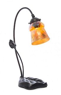 An Iridescent Glass and Bronze Table Lamp, Height of shade 4 5/8 x height overall 17 inches.