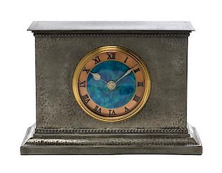 An English Arts and Crafts Enameled Pewter Table Clock, Liberty & Co., Width 9 inches.