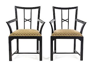 A Pair of Ebonized Open Armchairs, Height 34 3/4 inches.