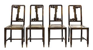 An Art Nouveau Hardwood Table and Four Chairs, Height of table 30 x width 27 1/2 x depth 27 1/2 inches.