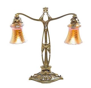 An Art Nouveau Style Cast Metal Table Lamp, Height of shade 5 1/2 x height overall 19 1/2 inches.