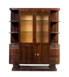 A French Art Deco Macassar Ebony Vitrine Cabinet, Height 55 1/8 x width 45 1/4 x depth 16 inches.