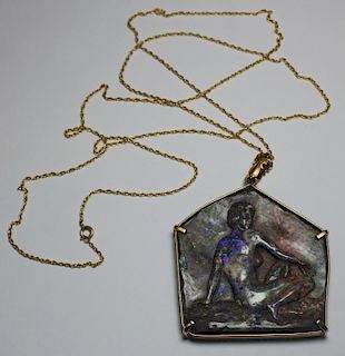 JEWELRY. Carved Phenomenal Stone and Gold Pendant.