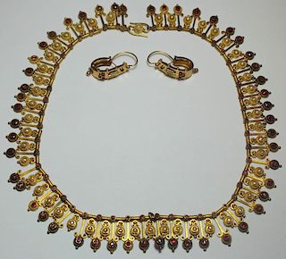 JEWELRY. Mughal Style Gold and Ruby Jewelry Suite.