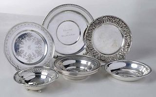 Seven Sterling Plates and Bowls