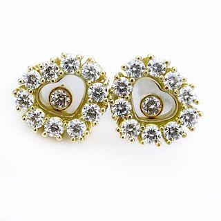 1.10 Carat Round Brilliant Cut Diamond and 18 Karat Yellow Gold Hearts Earrings.
