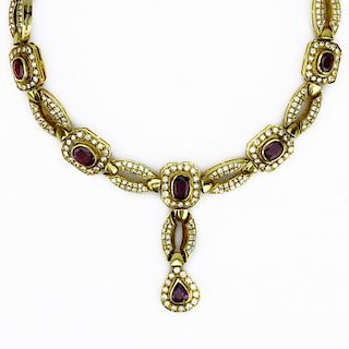 16.0 Carat Oval and Pear Shape Ruby, 2.50 Carat Round Brilliant Cut Diamond and 18 Karat Yellow Gold Pendant Necklace.