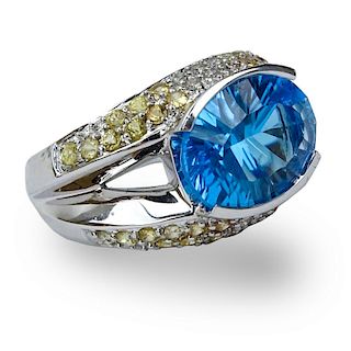 Oval Cut London Blue Topaz, Pave Set Yellow and White Diamond and 14 Karat White Gold Ring