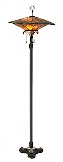 An Art Deco Iron and Mica Floor Lamp, Height overall 65 inches.