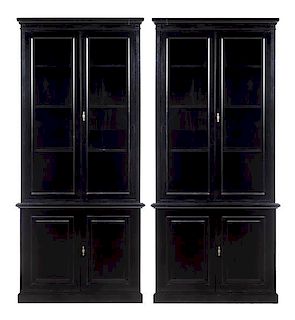 A Pair of Custom-Designed Ebonized Bookcases Height 93 x width 42 x depth 17 inches.