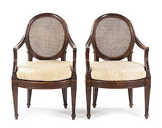 A Pair of Italian Walnut Fauteuils Height 36 inches.