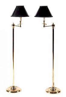 A Pair of Brass Swing-Arm Floor Lamps Height overall 48 1/2 inches.