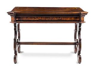 An Italian Baroque Walnut Desk Height 38 x width 56 5/8 x depth 28 1/2 inches.