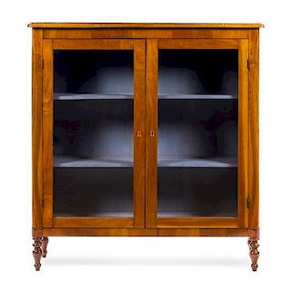 An Italian Walnut Bookcase Height 51 3/8 x width 48 1/2 x depth 13 inches.