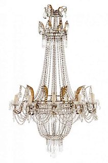 An Italian Tole and Glass Ten-Light Chandelier Height 47 1/2 x diameter 29 inches.