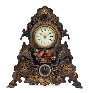 A Victorian Painted Tole Mantel Clock Height 20 1/4 inches.