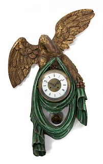 A Viennese Parcel Gilt Eagle Clock Height 29 inches.