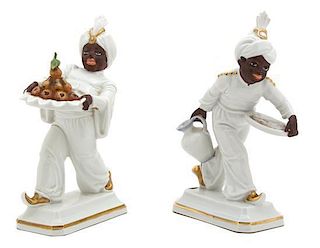 A Pair of English Porcelain Blackamoor Nubian Servant Figures Height 7 inches.