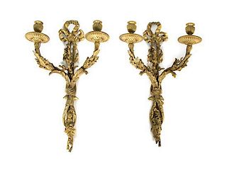 A Pair of Louis XVI Style Gilt Bronze Two-Light Wall Sconces Height 22 1/2 inches.