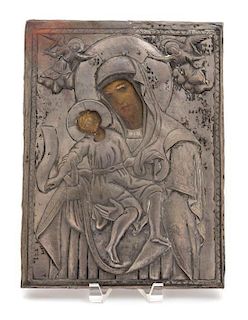 A Greek Icon Depicting the Virgin and Child with Silver Riza Height 13 inches.
