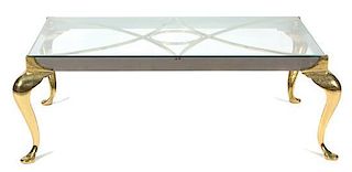 A Brass and Steel Glass Top Coffee Table Height 15 x width 29 x depth 44 inches.