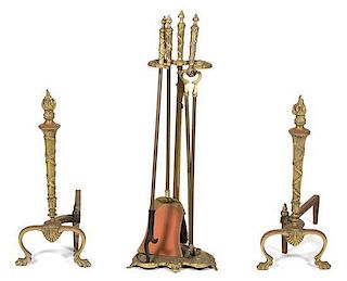 A Pair of Neoclassical Gilt Bronze Andirons and a Set of Fire Tools on Stand Height of andirons 21 inches.